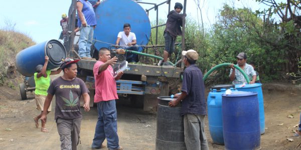 Water Tanker Delivering Water